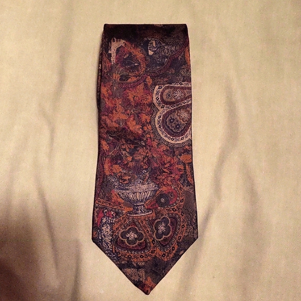 West coast 100 %. Silk neck tie for men CA 09074 brown with multicolored print